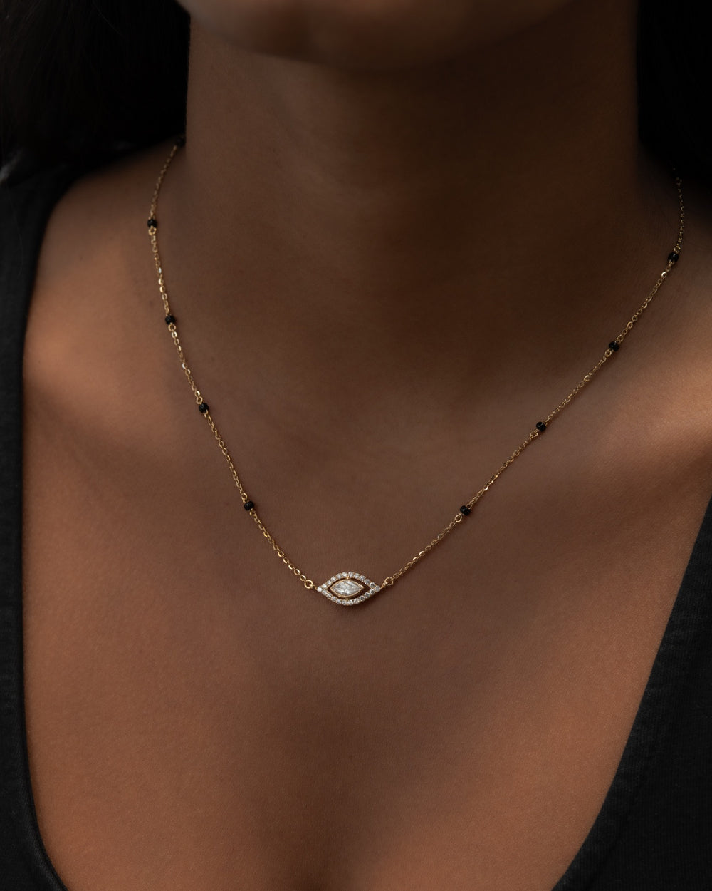 Víya Bezel Marquise and Round Diamond Evil Eye Mangalsutra Traditional Necklace 18K on body