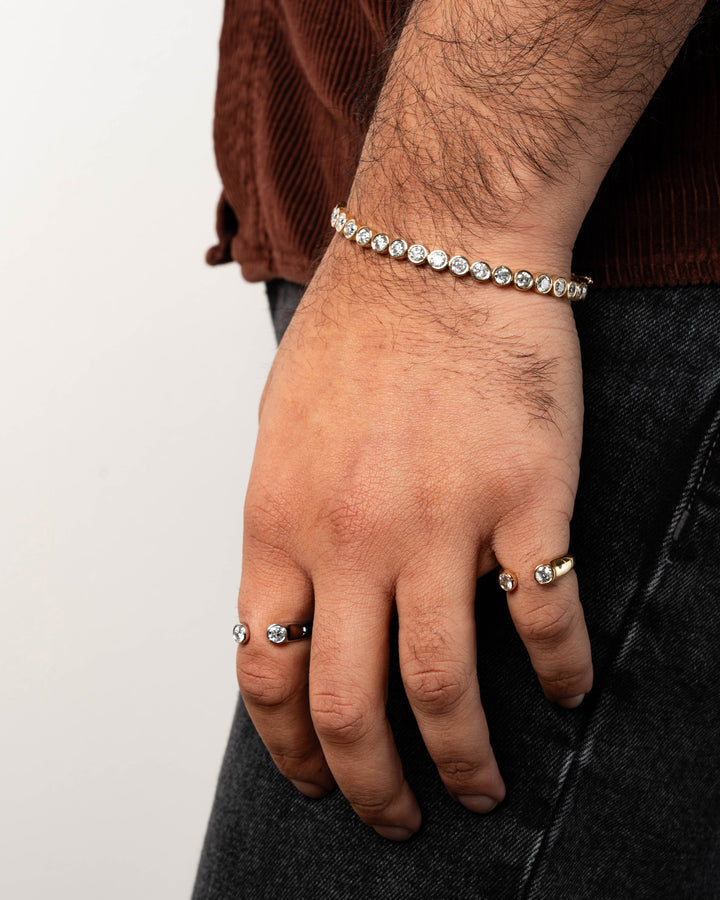 Round Diamond Bezel Tennis Bracelet Yellow Gold on body