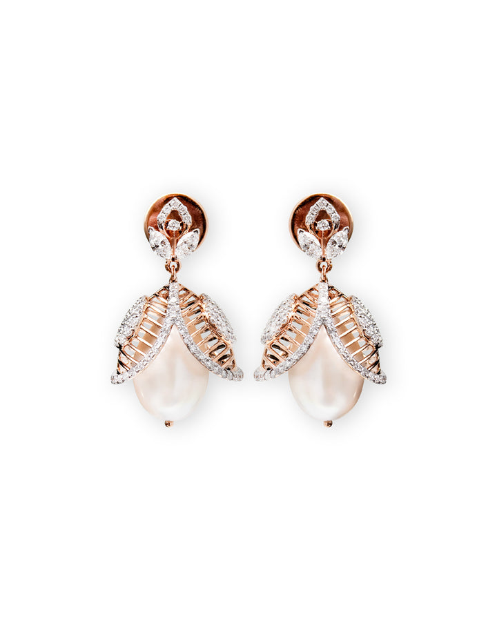 Pair of earrings with rose gold and pearl design on a white background
