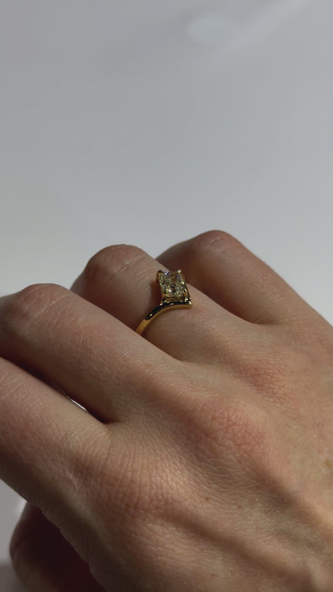 Solitaire Elongated Radiant Diamond Contemporary Engagement Ring on body