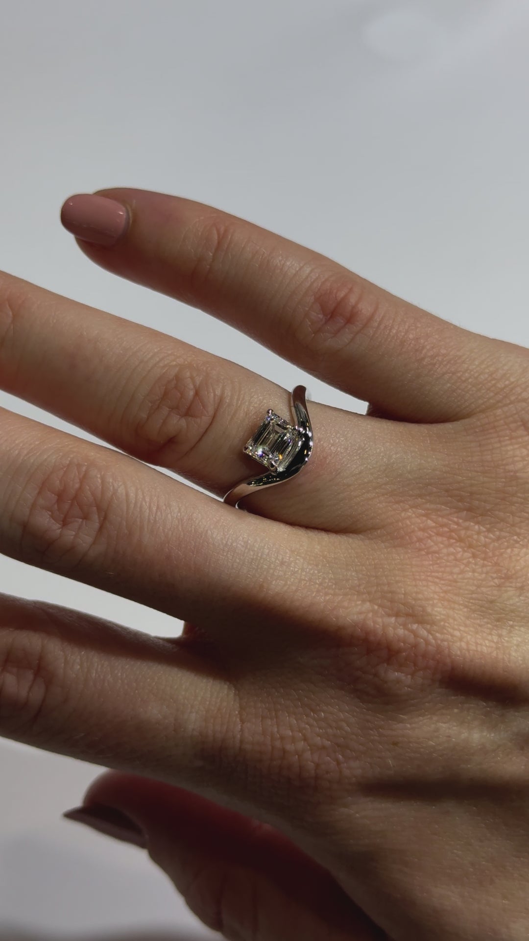 Emerald Diamond Contemporary East to West Engagement Ring on body